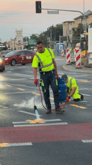Blowtorch work on a Warsaw pedestrian crossing