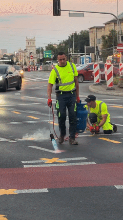 Blowtorch work on a Warsaw pedestrian crossing