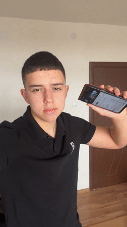 Young man dances, takes selfies in Bulgarian home