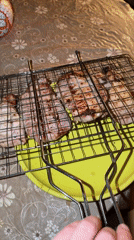 Backyard barbecue with grilled meat and beer in Udelnaya