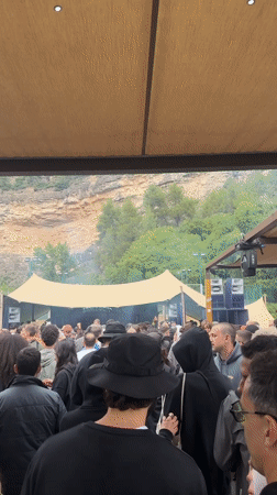 Crowd gathers for outdoor music event in Montanejos