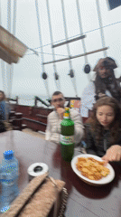 Pirate-themed ship with costumed performer docks at Varna harbor