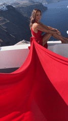 Santorini morning: fashion posing, white walls, flowing dresses