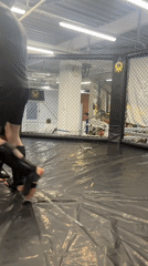 MMA fighters train in caged ring in Perm, Russia