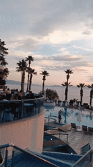 Twilight poolside scene captured at Turkish resort in Kuşadası