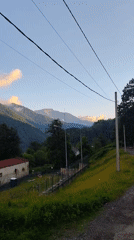 Krasnaya Polyana mountains and village in late afternoon light