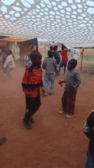 Children dance at community celebration in Kuru Karama, Nigeria