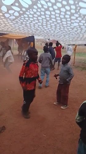Children dance at community celebration in Kuru Karama, Nigeria