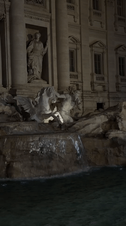 Trevi Fountain captured in nighttime illumination in Rome