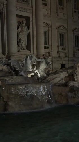Trevi Fountain captured in nighttime illumination in Rome