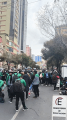 Student demonstration monitored by riot police in La Paz
