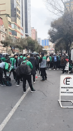 Student demonstration monitored by riot police in La Paz