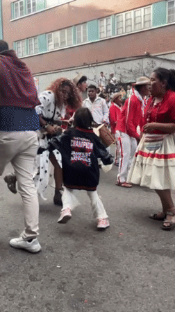 Traditional street parade with dancers celebrates in La Paz