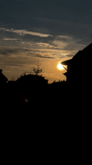 Sunset captured over Sofia building silhouette