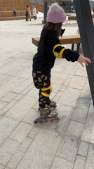 Young girl rollerblading in Yekaterinburg public square