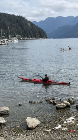 Kayakers enjoy evening paddle session in North Vancouver harbor