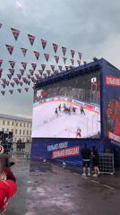 Russian Town Gathers for Outdoor Hockey Viewing Despite Rain