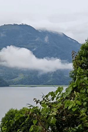 Phewa Lake and clouded hills from Pokhara's forested viewpoints