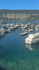 Morning scenes captured in Herceg Novi harbor and pool
