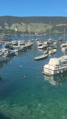 Morning scenes captured in Herceg Novi harbor and pool