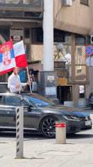 Flag-waving demonstration and coffee shop visit captured in Kragujevac