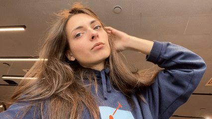 Woman photographed in multiple portrait sessions, Krasnoyarsk