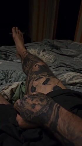 Tattooed man filmed resting on bed in Stara Zagora