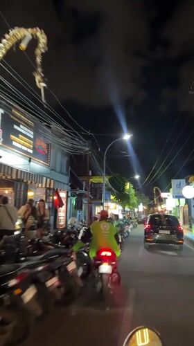 Kuta nighttime traffic jam, with a possible injury on scene