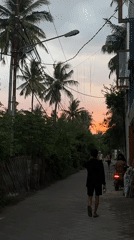 Dusk street scenes captured in unknown Indonesian town