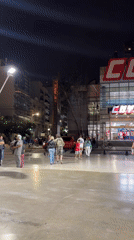 Nighttime gathering recorded outside Buenos Aires COTO supermarket