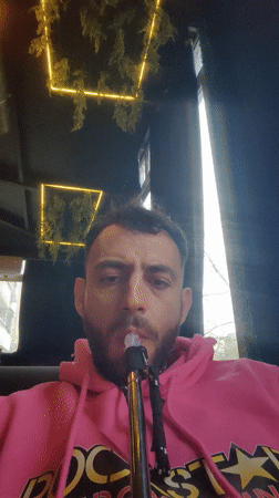 Man smokes hookah indoors in Sofia, Bulgaria