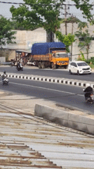 Morning traffic and rural life along a Sroyo highway