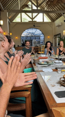 Group brunch at a sunlit Ubud café with coffee and company