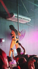 Pole dancer performs for cheering crowds at Buenos Aires nightclub