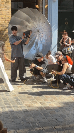 Outdoor photo shoot on a sunny London cobblestone street