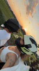 Motorcycle riders document sunset journey through North Kuta rice paddies