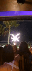 Fire dancers perform for diners at Đà Nẵng beachfront restaurants