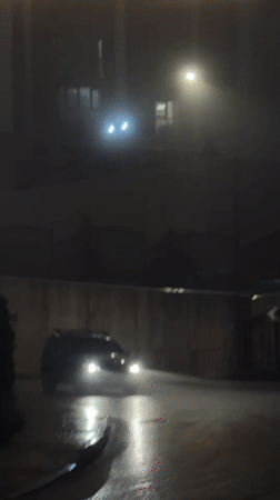 Foggy night scenes captured across Sochi during rainy evening