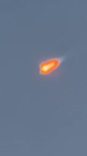 Fiery streak and contrail cross the sky near Vandenberg