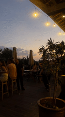 Sunset gathering captured at Kuta Selatan beachfront venue