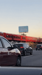 Evening rush hour traffic, train, helicopter observed in Buenos Aires