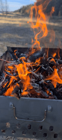 Beachside barbecue captured in rural Latvia countryside setting