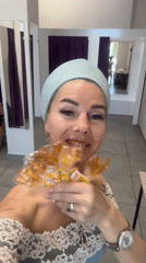 Woman with rooster lollipops films herself in Abakan store
