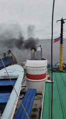 Cargo loading operation documented at Shcheleiki port facility