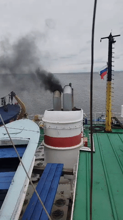 Cargo loading operation documented at Shcheleiki port facility