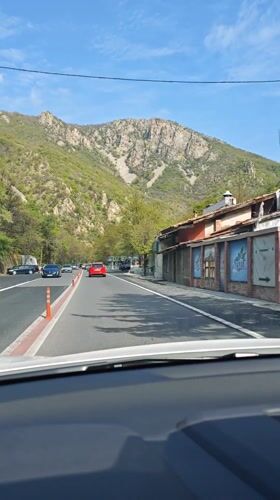 Morning traffic flows on mountain highway near Stara Kresna