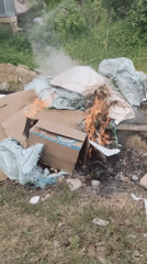 Trash burning observed in Indonesian village, local food documented
