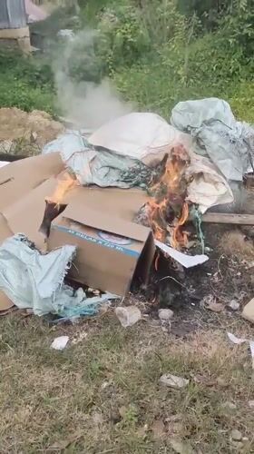 Trash burning observed in Indonesian village, local food documented