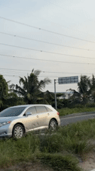Luxury SUVs parked roadside in Igboefon, Nigeria