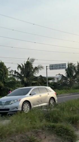 Luxury SUVs parked roadside in Igboefon, Nigeria